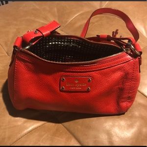 Red Kate Spade crossbody purse